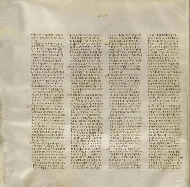 A parchment page written in four narrow columns of Greek capital letters without word-division.