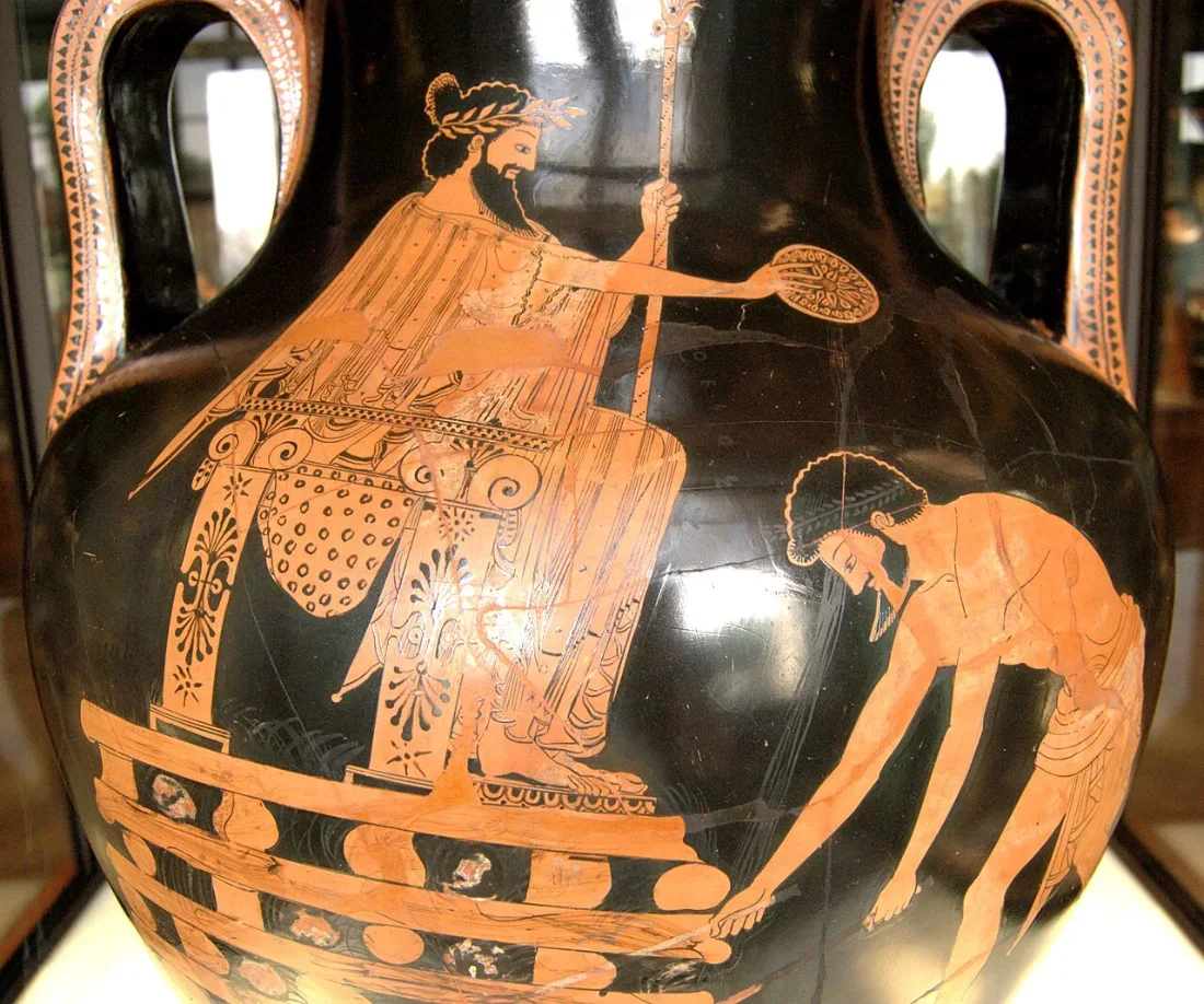 A red-figure amphora: a king enthroned on a pyre pours a libation while a man lights the wood.