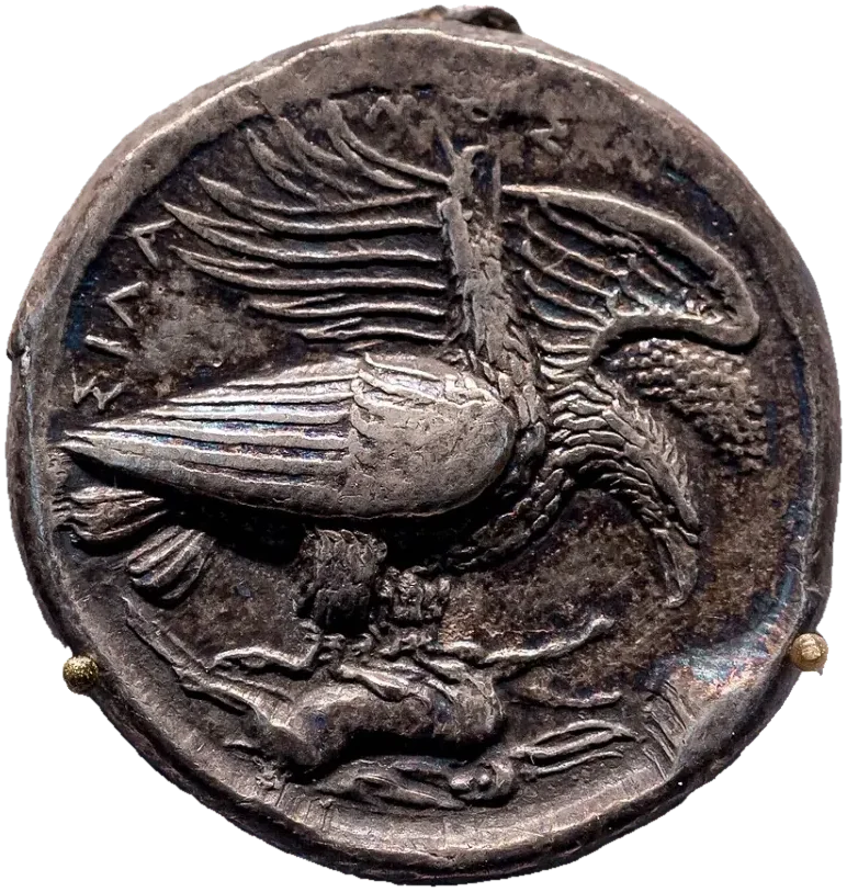 A silver coin: two eagles stand over a dead hare, one with wings spread.