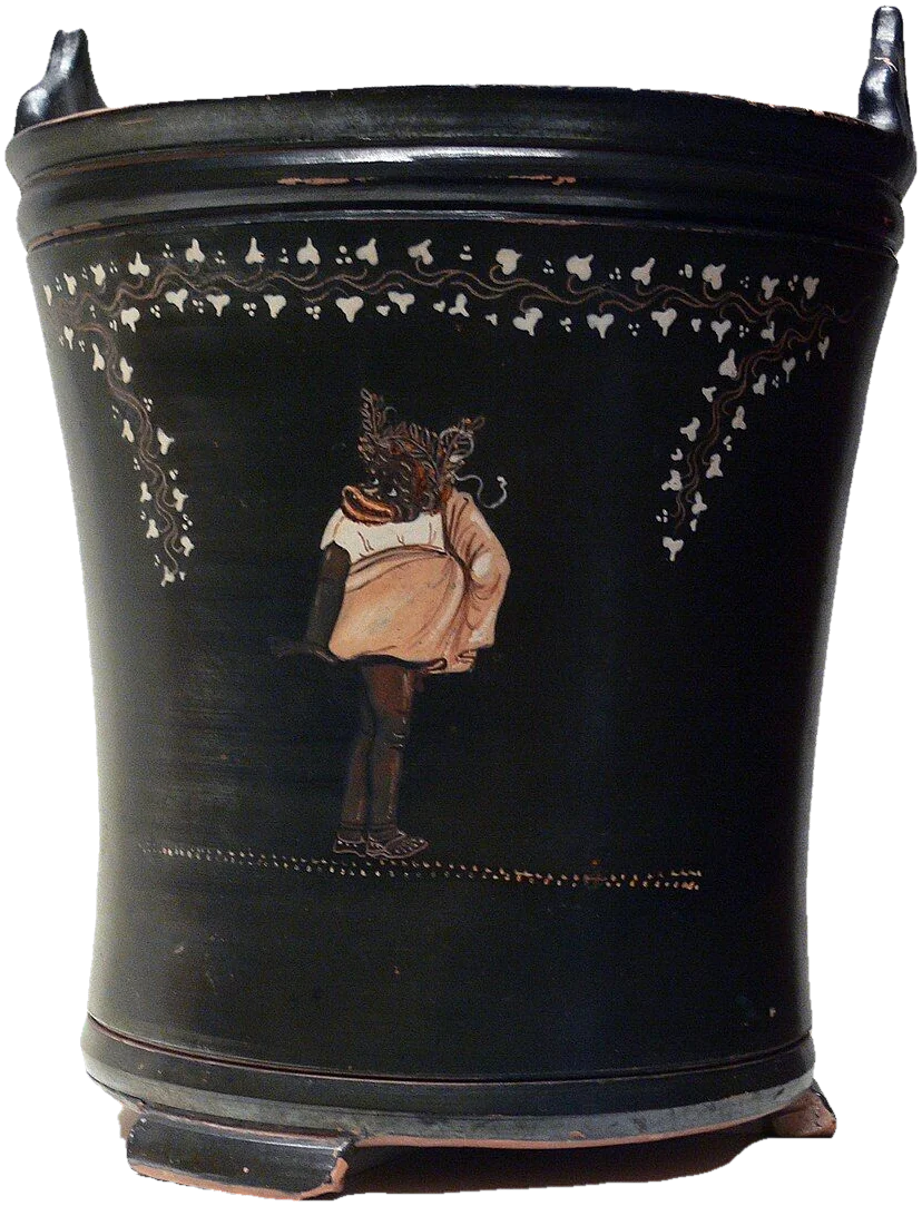 Black bucket-shaped vase painted with a small figure of a costumed comic actor.