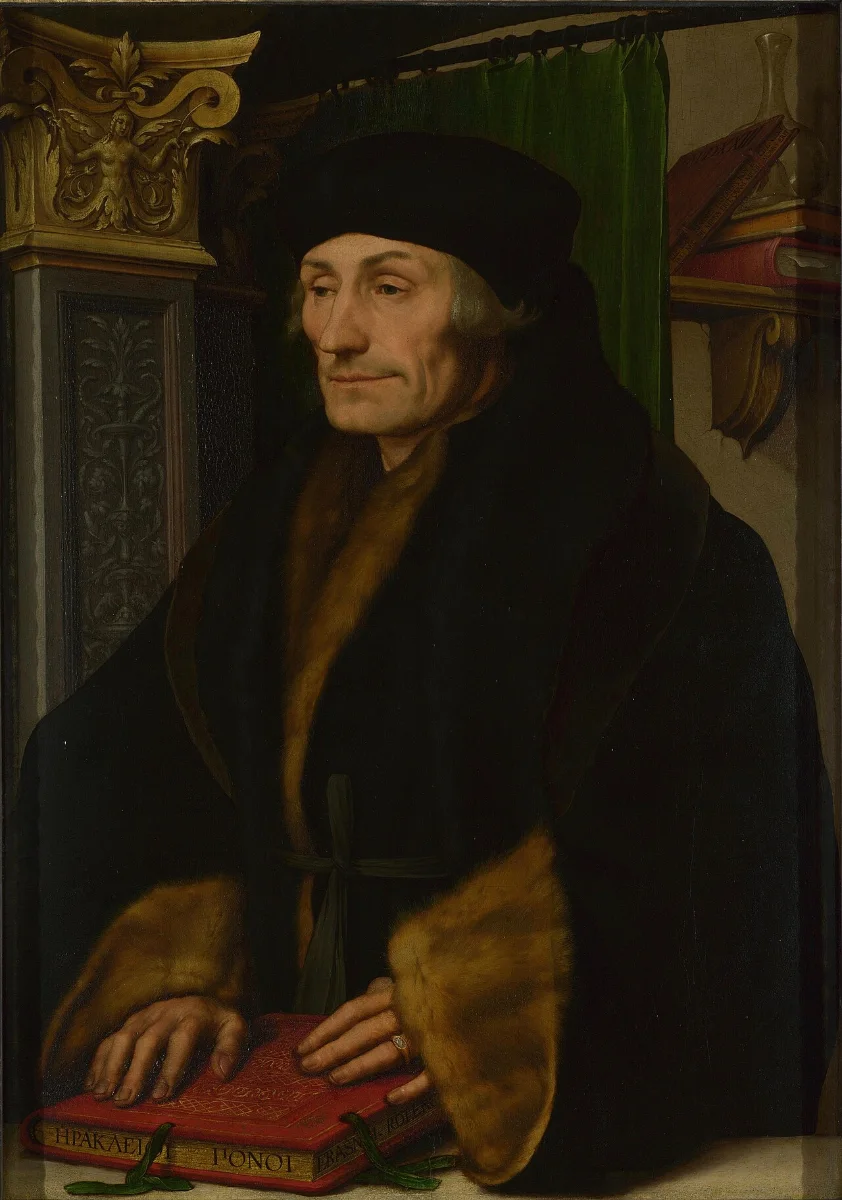Half-length portrait of Erasmus in a black cap and fur-trimmed coat, his hands resting on a book, a pilaster behind him.