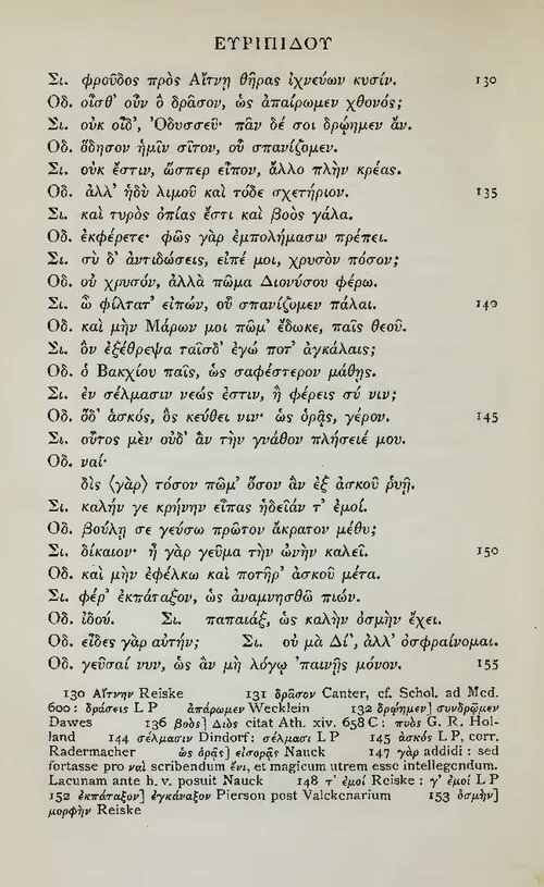 A printed page of Greek verse, the speakers’ names at the left, with a block of small-type critical notes at the foot.